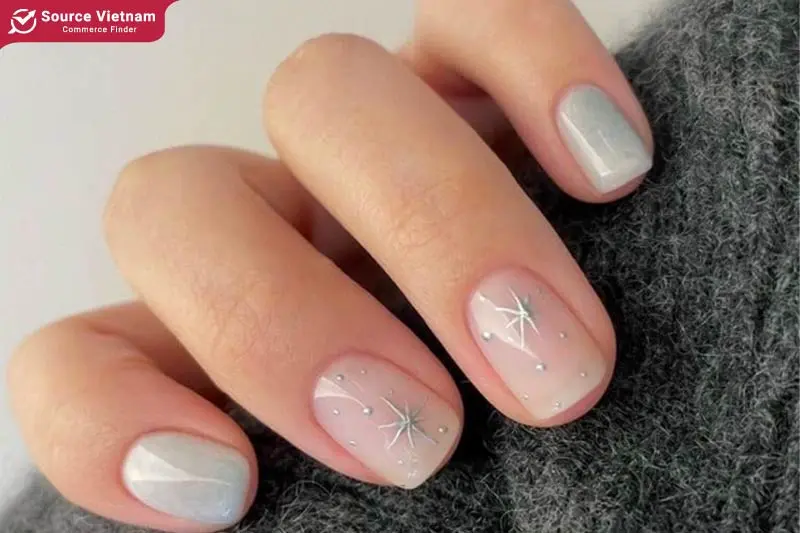 Minimalist snowflake nail art